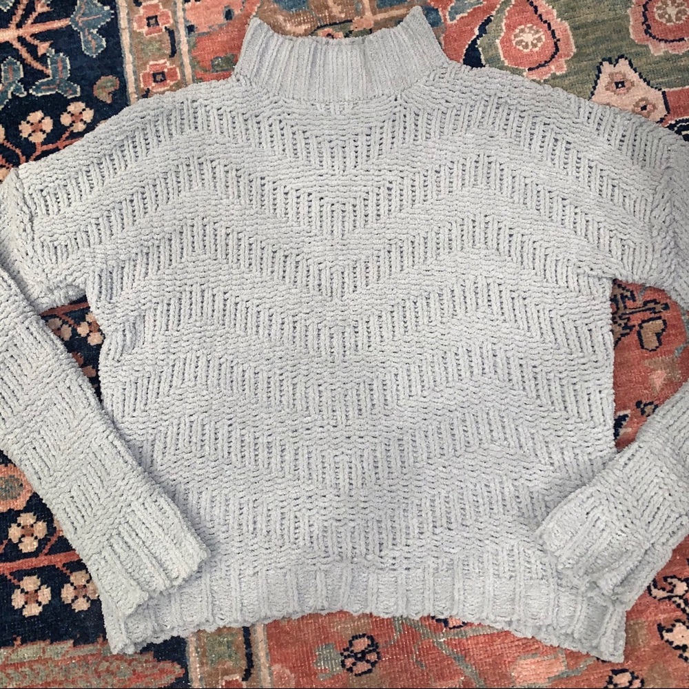 light green sweater